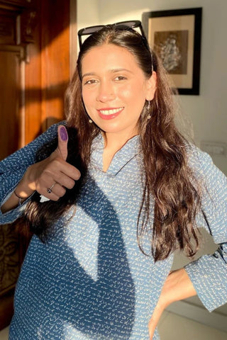 Manto Community wearing Khayaal Blue Kurta with Urdu Calligraphy