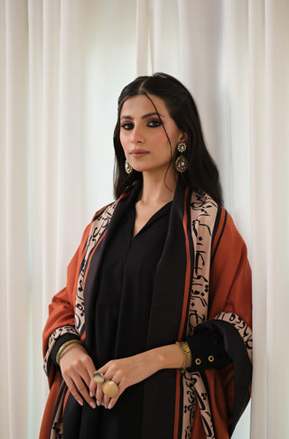 Manto's Unisex Rustic Orange Winter Shawl featuring Urdu Calligraphy on the Borders