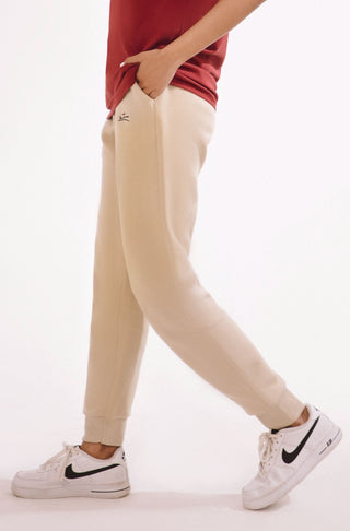 Shopmanto, wear manto, pakistan, women, men, ladies, clothing, urdu, calligraphy, jogger pants, winter wear, karachi, western clothing, manto store, urdu calligraphy clothing, unisex jogger pants, unisex winter wear, hoodies in pakistan, jogger pants for men, jogger pants for women, track pants, track suits, comfort, soft, French vanilla Jogger pants, manto logo embroidery on jogger pants, comfort revolution