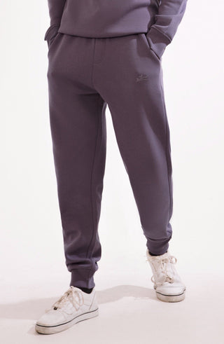 Shopmanto, wear manto, pakistan, women, men, ladies, clothing, urdu, calligraphy, jogger pants, winter wear, karachi, western clothing, manto store, urdu calligraphy clothing, unisex jogger pants, unisex winter wear, hoodies in pakistan, jogger pants for men, jogger pants for women, track pants, track suits, comfort, soft, ash lavender Jogger pants, manto logo embroidery on jogger pants, comfort revolution