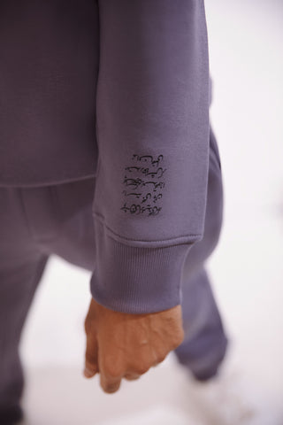 Shopmanto, wear manto, pakistan, women, men, ladies, clothing, urdu, calligraphy, hoodies, sweatshirt, jogger pants, winter wear, karachi, western clothing, manto store, urdu calligraphy clothing, unisex hoodies, unisex winter wear, sweatshirts in pakistan, sweatshirts for men, sweatshirts for women, unisex sweatshirts, comfort, soft, track suit, Ash Lavender Talaash Sweatshirt, text print at the back of sweatshirt, text print on sleeves, printed sweatshirt, comfort revolution
