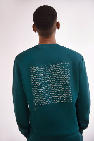 Shopmanto, wear manto, pakistan, women, men, ladies, clothing, urdu, calligraphy, hoodies, sweatshirt, jogger pants, winter wear, karachi, western clothing, manto store, urdu calligraphy clothing, unisex hoodies, unisex winter wear, sweatshirts in pakistan, sweatshirts for men, sweatshirts for women, unisex sweatshirts, comfort, soft, track suit, deep teal Talaash Sweatshirt, text print at the back of sweatshirt, text print on sleeves, printed sweatshirt, comfort revolution