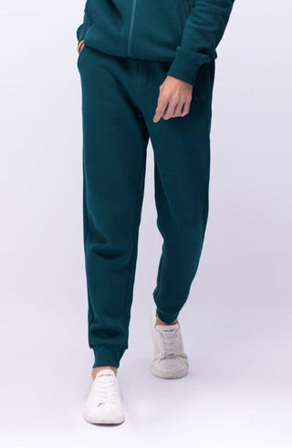 Shopmanto, wear manto, pakistan, women, men, ladies, clothing, urdu, calligraphy, jogger pants, winter wear, karachi, western clothing, manto store, urdu calligraphy clothing, unisex jogger pants, unisex winter wear, hoodies in pakistan, jogger pants for men, jogger pants for women, track pants, track suits, comfort, soft, deep teal Jogger pants, manto logo embroidery on jogger pants, comfort revolution