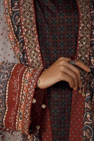 Woman wearing Manto's long, patterned coat, featuring Urdu calligraph & Illustration