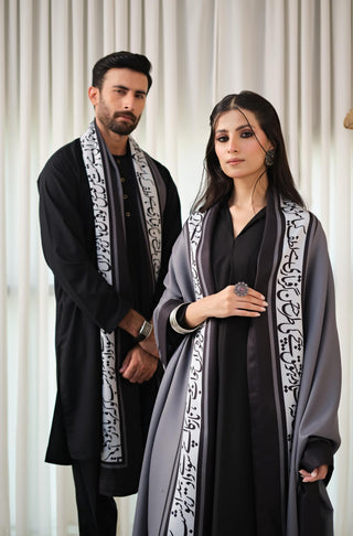 Manto's Unisex Grey Winter Shawl featuring Urdu Calligraphy on the Borders