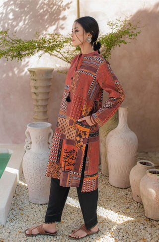 Shopmanto, wear manto, manto clothing brand, manto pakistan, ladies clothing brand, urdu calligraphy clothing, manto rust and orange saqafat khaddar kurta with urdu calligraphy, manto winter collection, manto khaddar collection, khaddar kurtas, random urdu words calligraphy on kurta