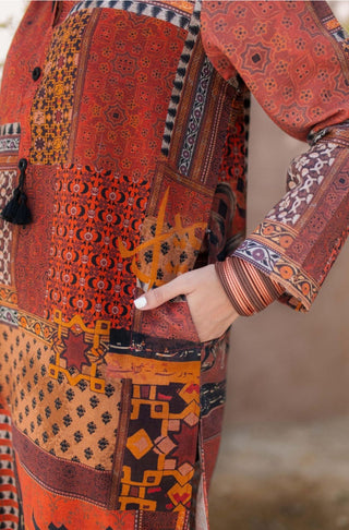 Shopmanto, wear manto, manto clothing brand, manto pakistan, ladies clothing brand, urdu calligraphy clothing, manto rust and orange saqafat khaddar kurta with urdu calligraphy, manto winter collection, manto khaddar collection, khaddar kurtas, random urdu words calligraphy on kurta
