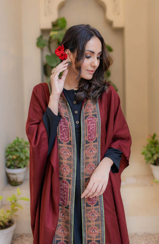 Shopmanto, wear manto, manto clothing brand, unisex cape shawl, cape shawl, men cape shawl, women cape shawl, capes, shawl, winter wear, eastern, western, urdu calligraphy on the cape shawl, cape in maroon, talaash cape, men outerwear, women outerwear, talaash cape maroon and green, manto capes, manto shawl